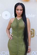 Discover the Secrets of Saweetie's Sibling Success